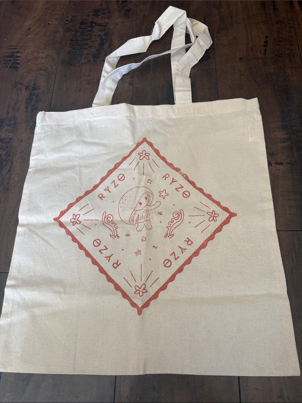 Ryze Cream Canvas Tote Bag with Orange Print